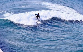 mission beach surfer - Scenic Cycle Tours - San Diego Bike Tours