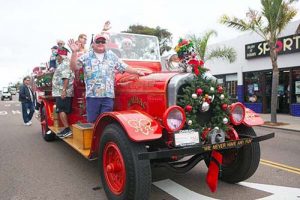 pb christmas parade fire fighters - San Diego Scenic Cycle Tours