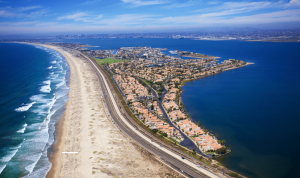 between the ocean and bay photo by coronado visitor center
