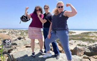 Three riders laughing on our bike tour